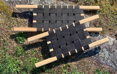 Contoured wooden yoke pieces on a workbench